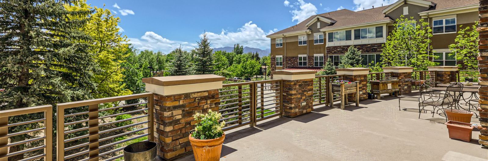 Someren Glen Senior Living Community in Centennial, CO - sunny vista living center exterior patio2