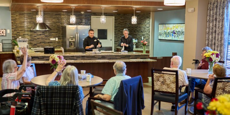 Someren Glen Senior Living Community in Centennial, CO - the retreat residents enjoying a cooking class