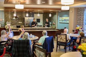 Someren Glen Senior Living Community in Centennial, CO - the retreat residents enjoying a cooking class