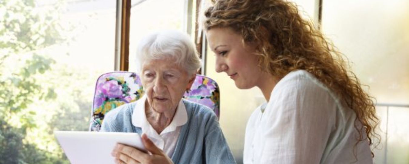 Someren Glen Senior Living Community in Centennial, CO - resident with staff