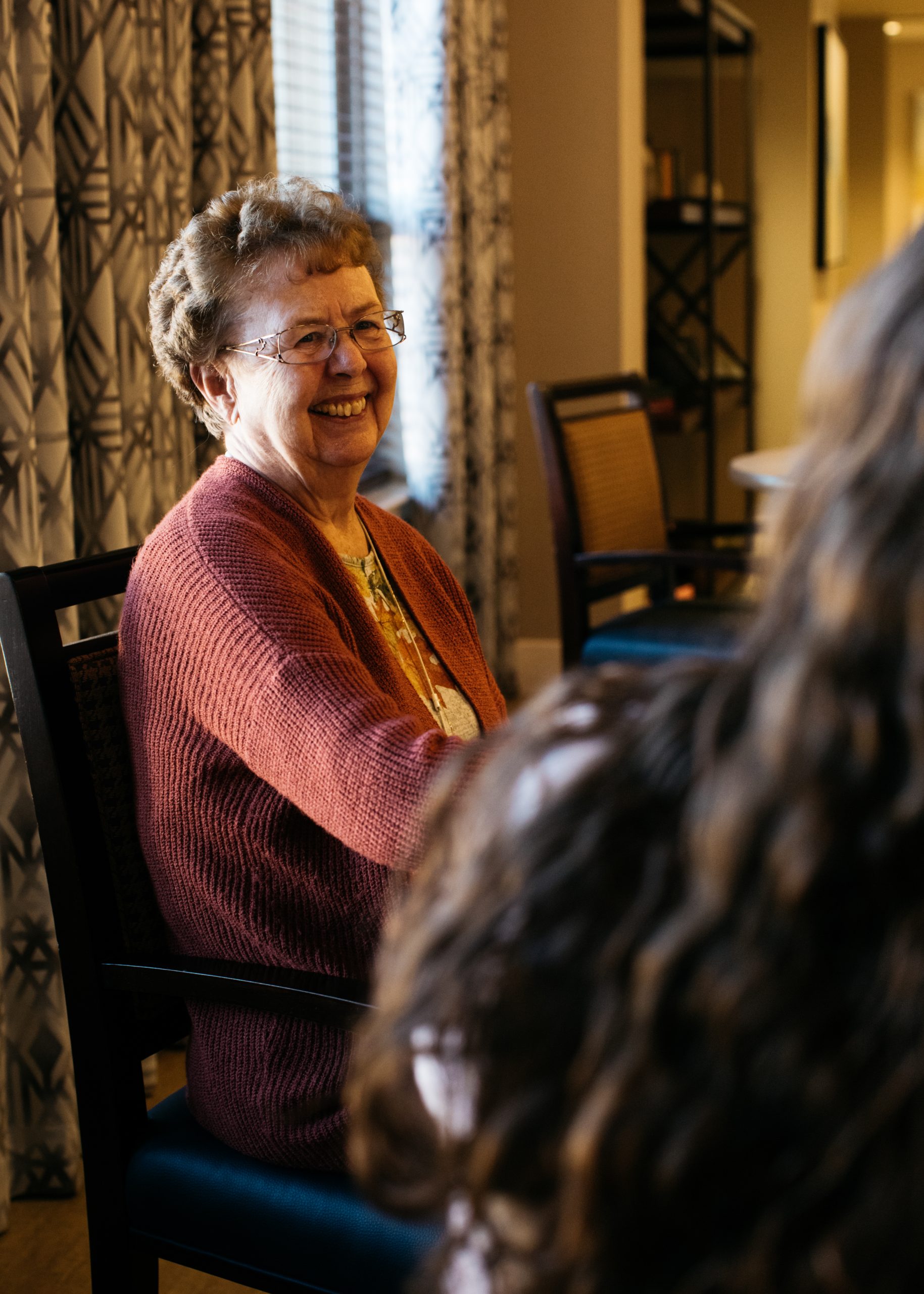 Sunny Vista Senior Living Community in Colorado Springs, CO - the retreat resident in conversation portrait